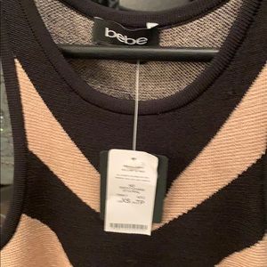 Bebe stretch material  xs with tags